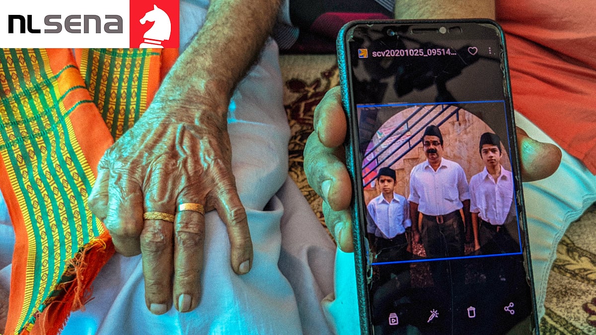 RSS volunteer Prasad T with his two sons.