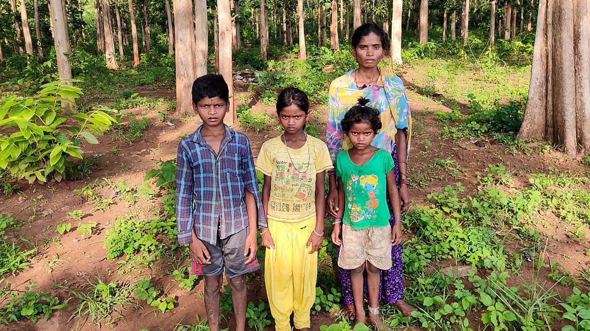 Santosh Markam's widow Sukki with her children. 