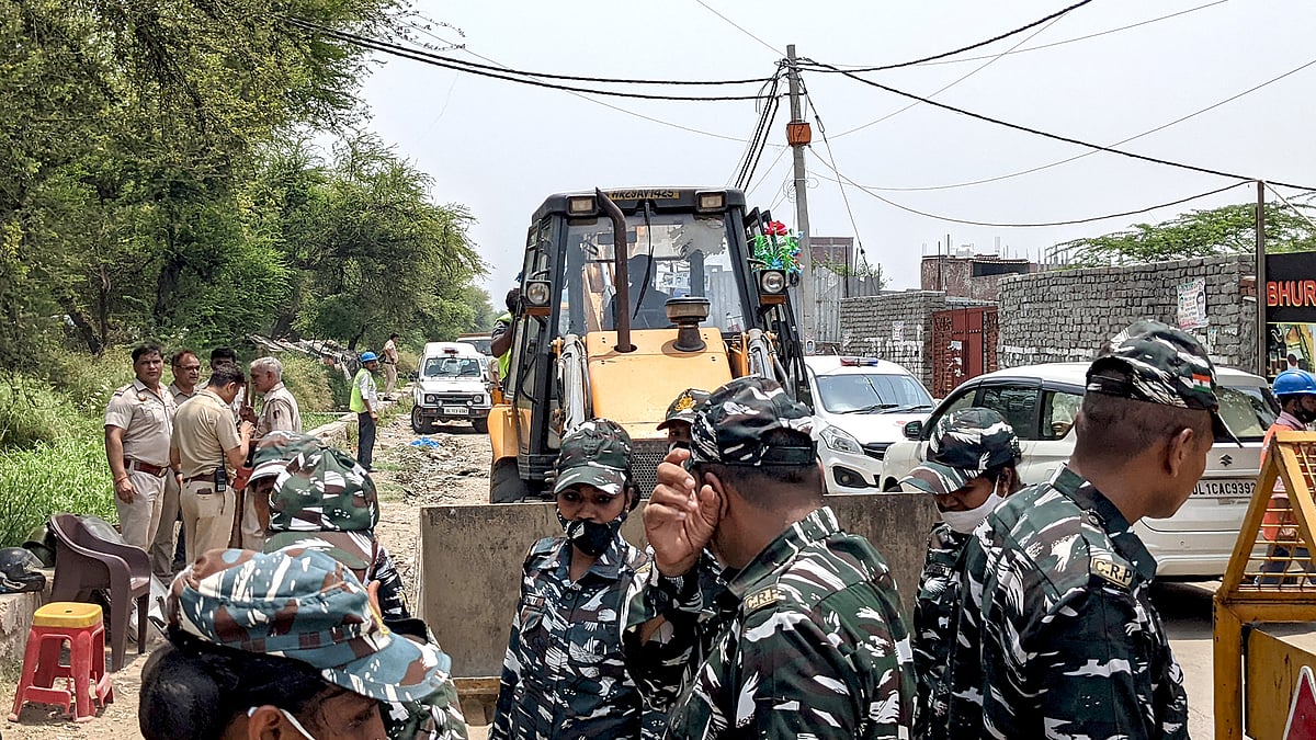 The demolition crew in Madanpur Khadar.