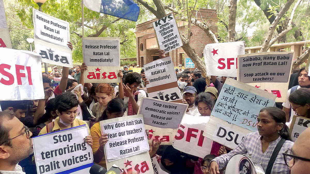 Students protest Ratan Lal's arrest at Delhi University on Saturday. 