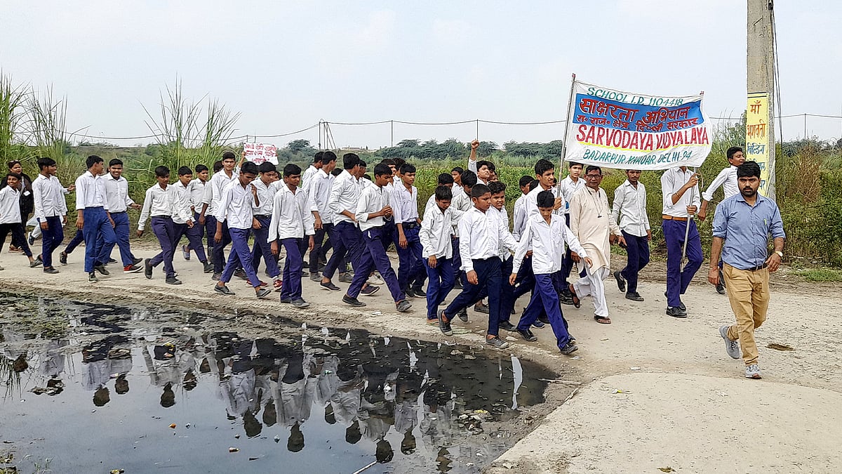 Children in Badarpur Khadar village participating in an enrolment drive.