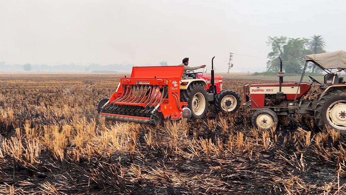 A farmer uses a super seeder in Sangrur. 