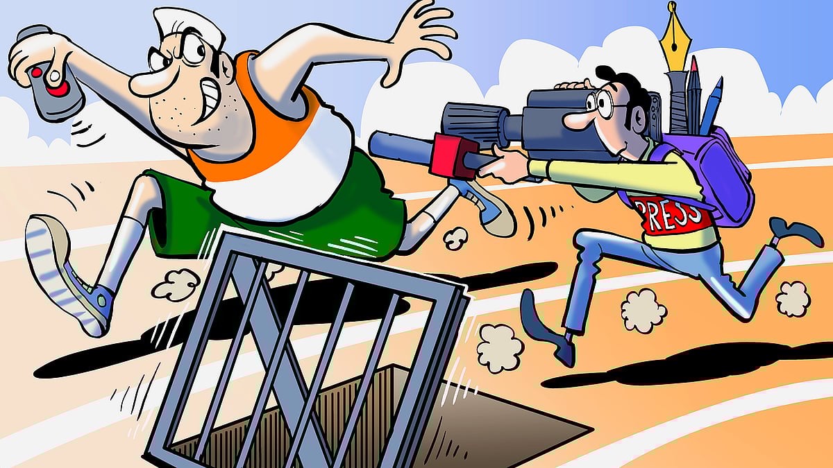 A cartoon depicts a politician racing ahead of a journalist while trying to stop him with a remote-controlled trap door.