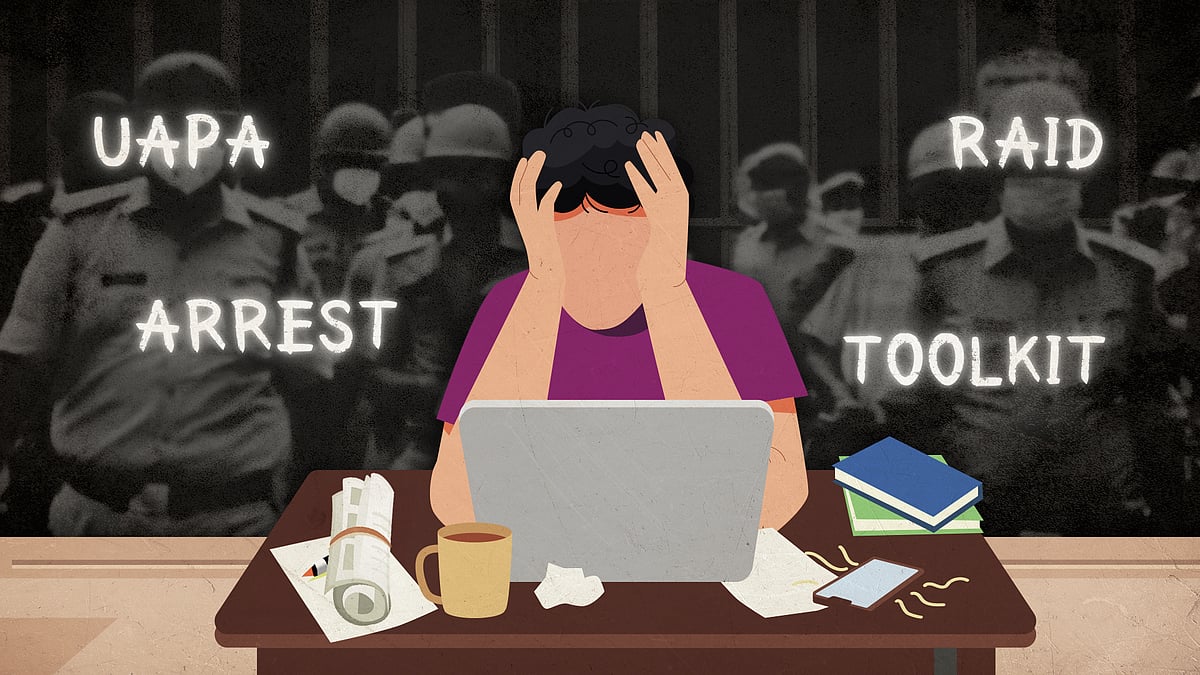 Image of journalist at their desk, head in their hands. The words UAPA, raid, arrest and toolkit are in the background.