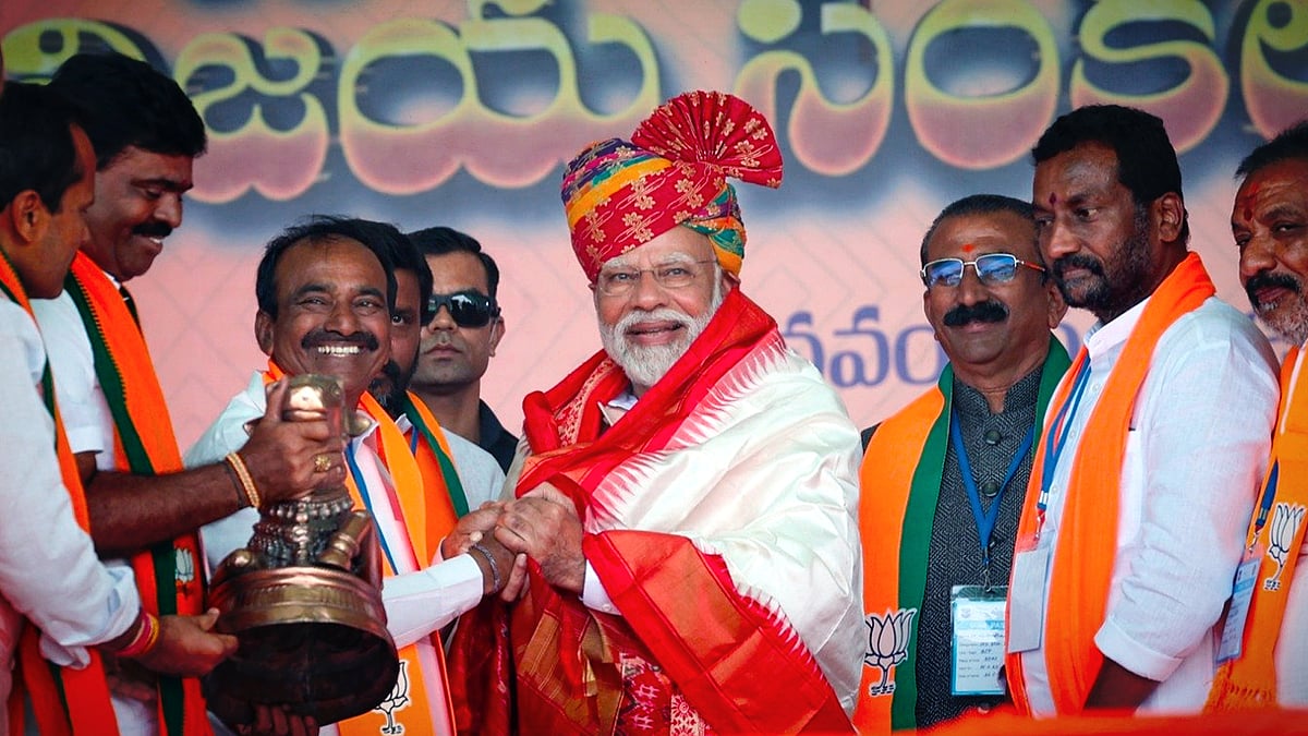 PM Narendra Modi with Eatala Rajender and other Telangana BJP leaders. (Source: X/BJP.)