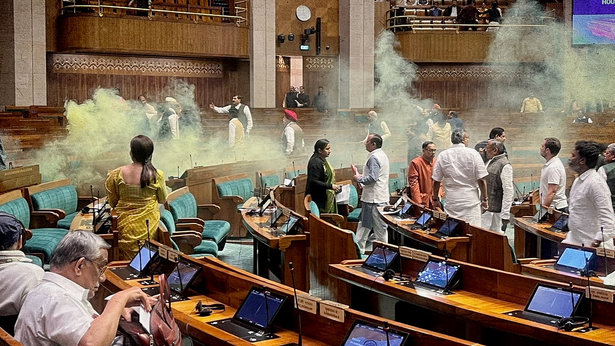 A picture of the Parliament with alleged tear gas in the air.