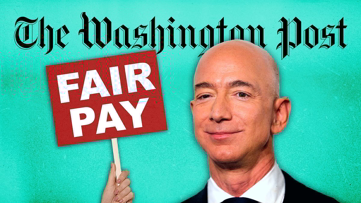 A picture of Jeff Bezos alongside a placard saying 'fair pay'. 