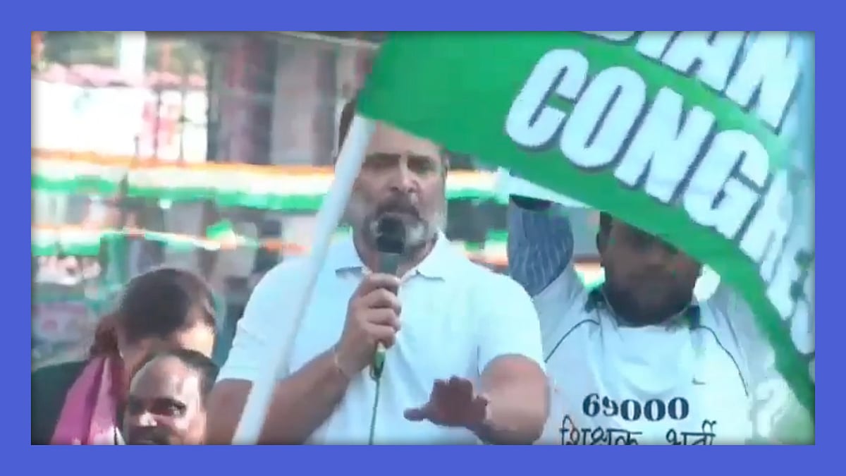 वायरल वीडियो का स्क्रीनशॉट, जिसमें राहुल गांधी कार्यकर्ताओं को पत्रकार को न पीटने की बात कह रहे हैं. 