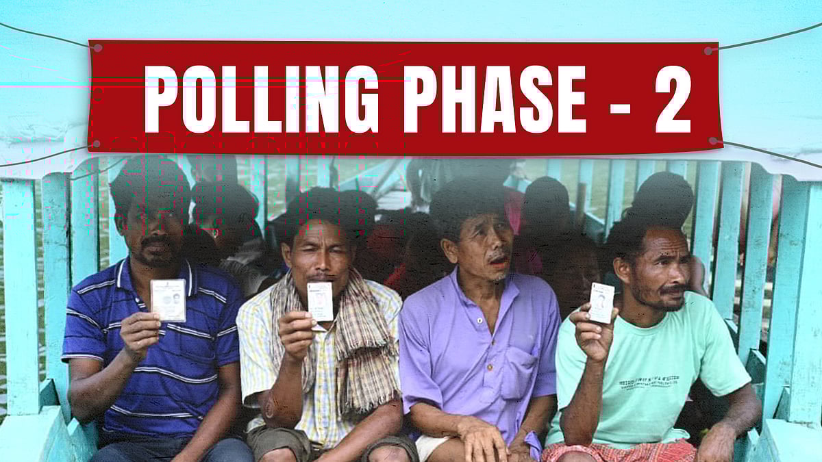 A picture of voters on the way to the polling booth in a boat in Tripura. 