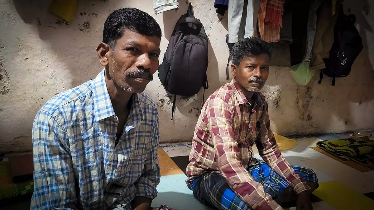 Kartik (right) and Babulal in their room in Ernakulam. Both are migrants from Odisha.