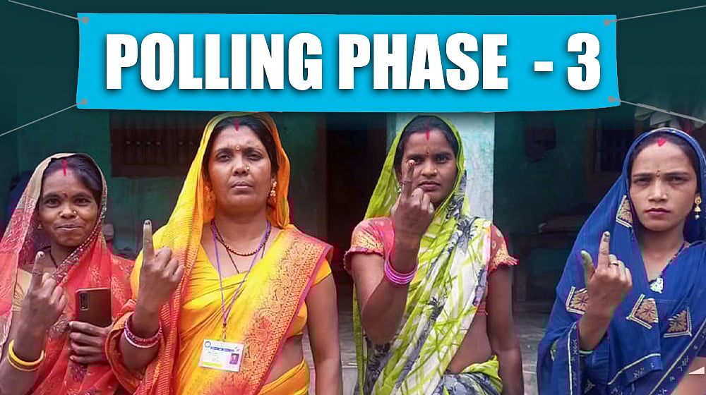A picture of four women at a polling station. 