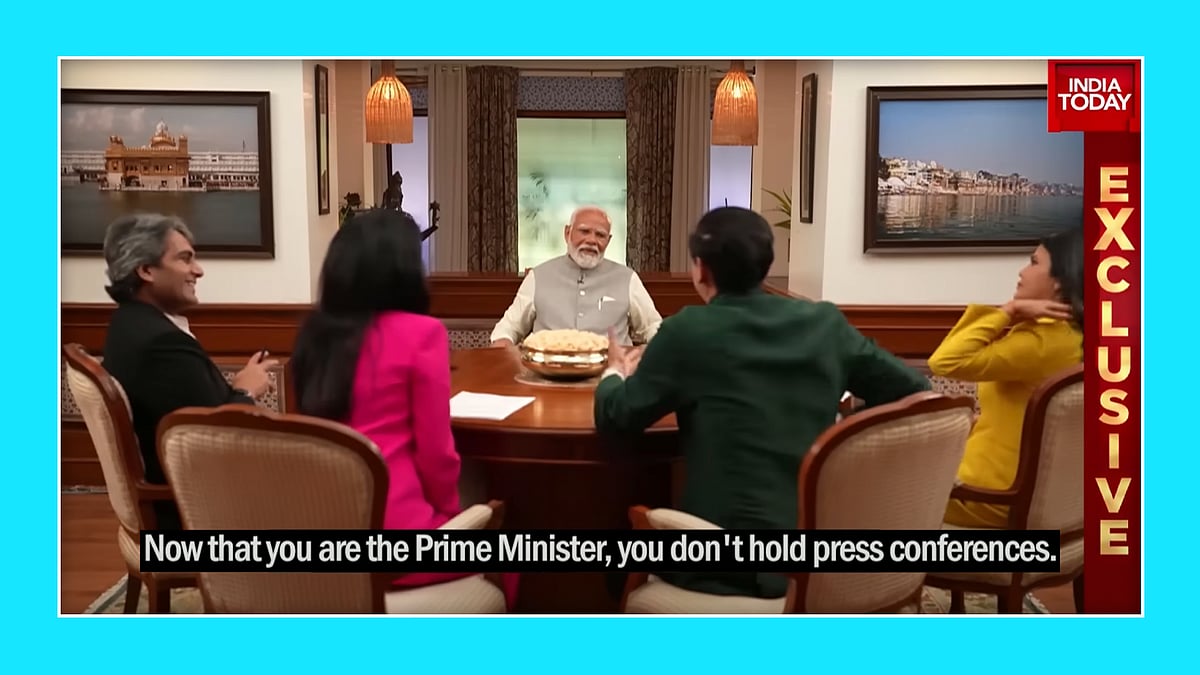 Modi at the India Today interview with four news anchors.