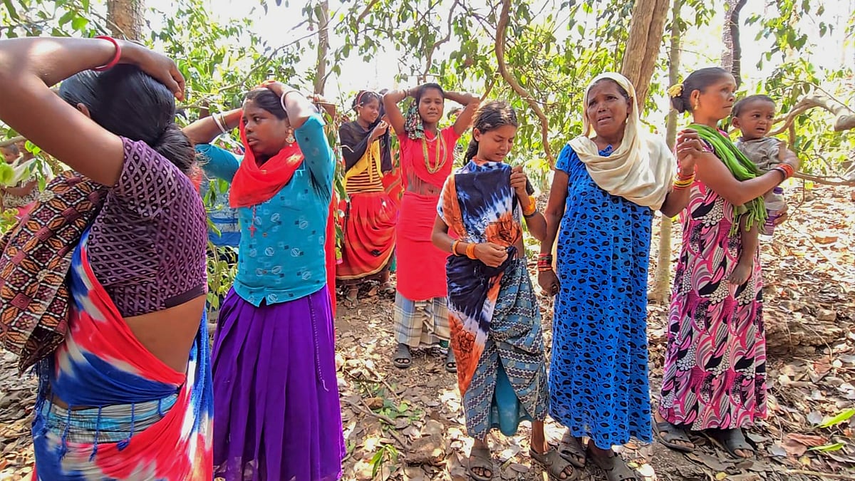 Villagers in Pidiya after the police action.