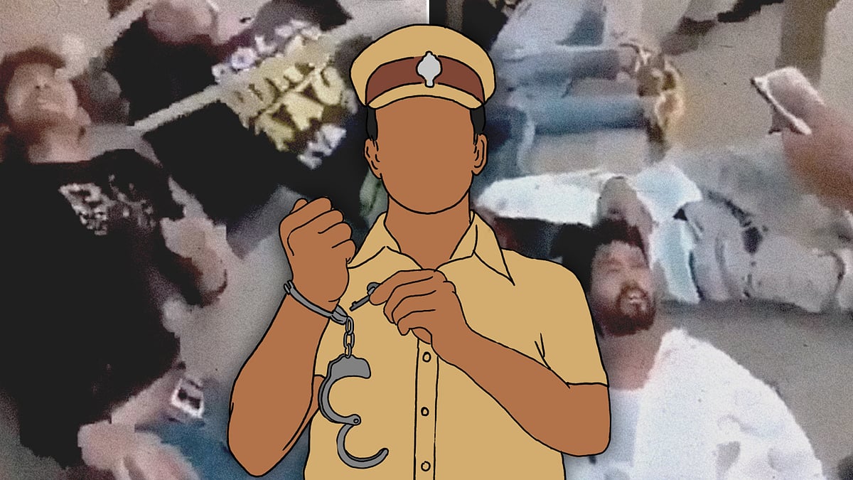 A cop opening the handcuff on his hand.