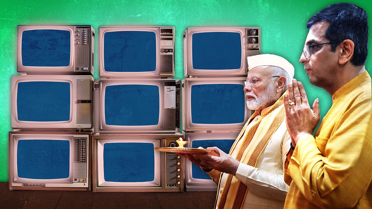 PM Narendra Modi and CJI DY Chandrachud together on Ganesh Pooja, with shut TV screens in the background.  