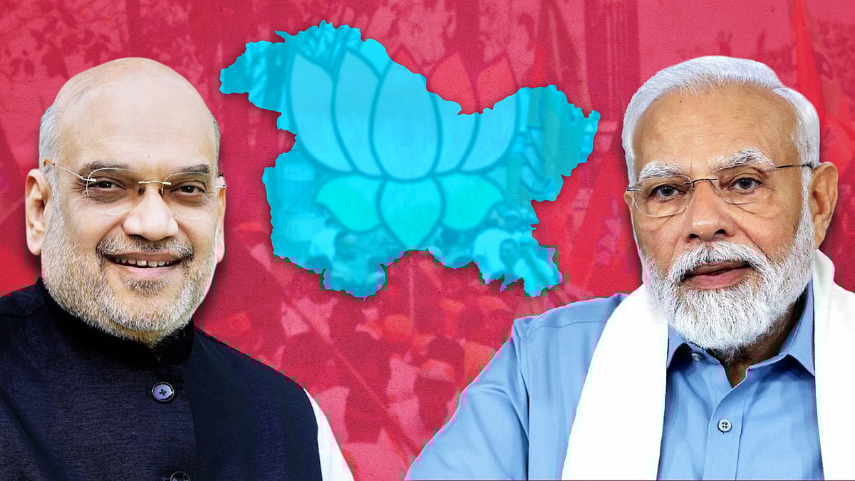 Amit Shah and Narendra Modi with a map of Jammu and Kashmir.