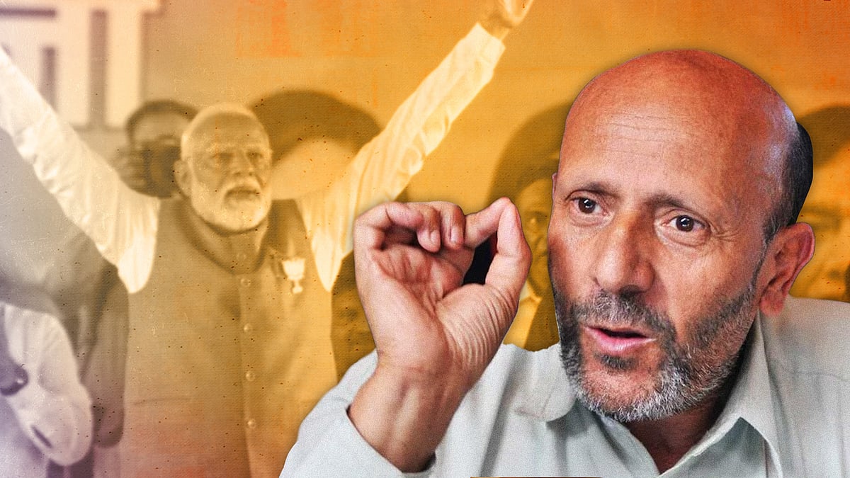 Engineer Rashid with Modi in the background. 