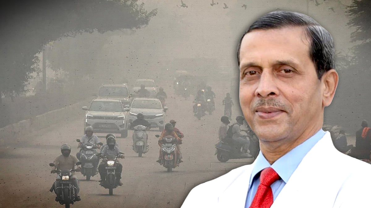 Dr Arvind Kumar with a photo of Delhi smog,