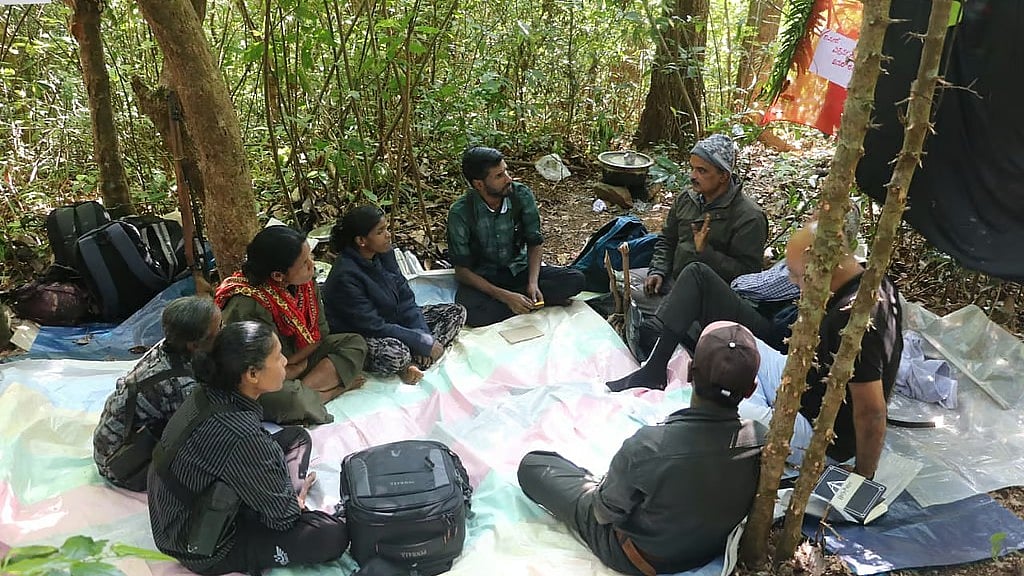 Maoists talking to civil society members of the Naxal Surrender and Rehabilitation Committee in Chikkamagalur.