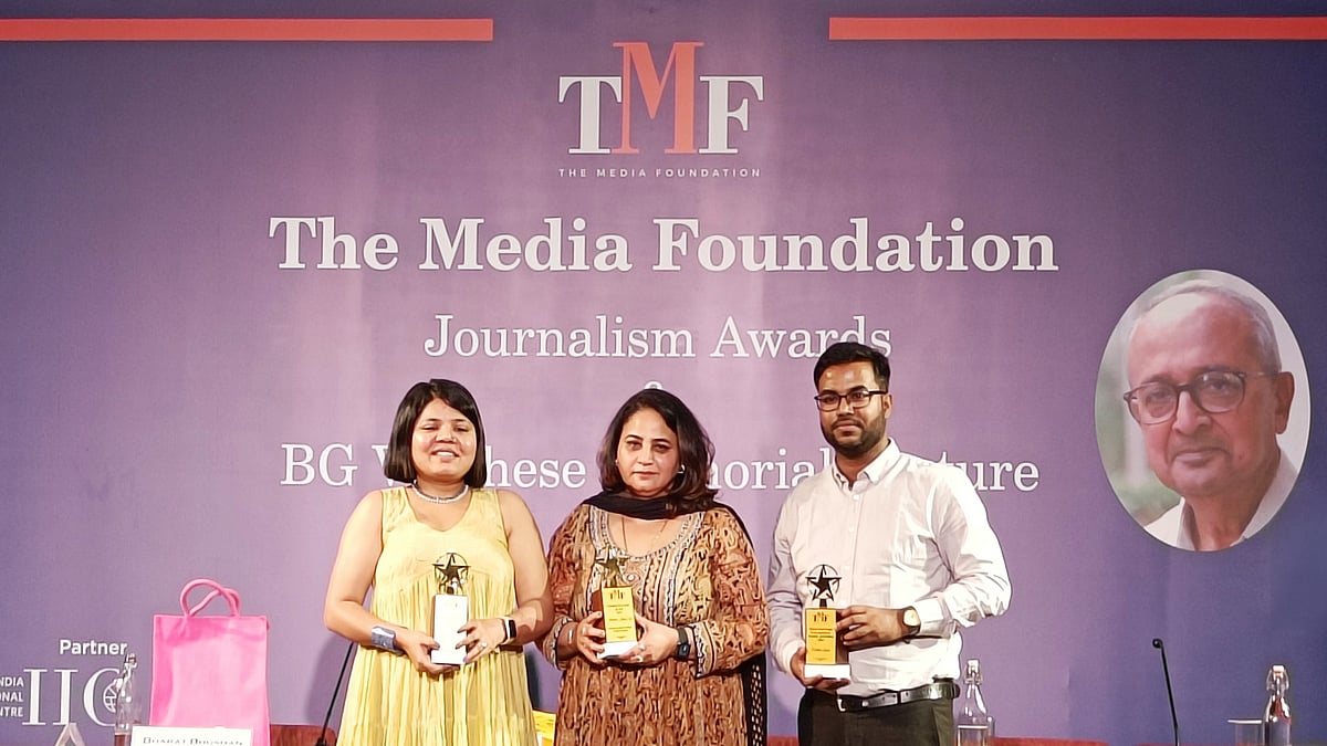 Journalists Priyanka Tupe, Jatinder Kaur Tur and Rokibuz Zaman with their awards