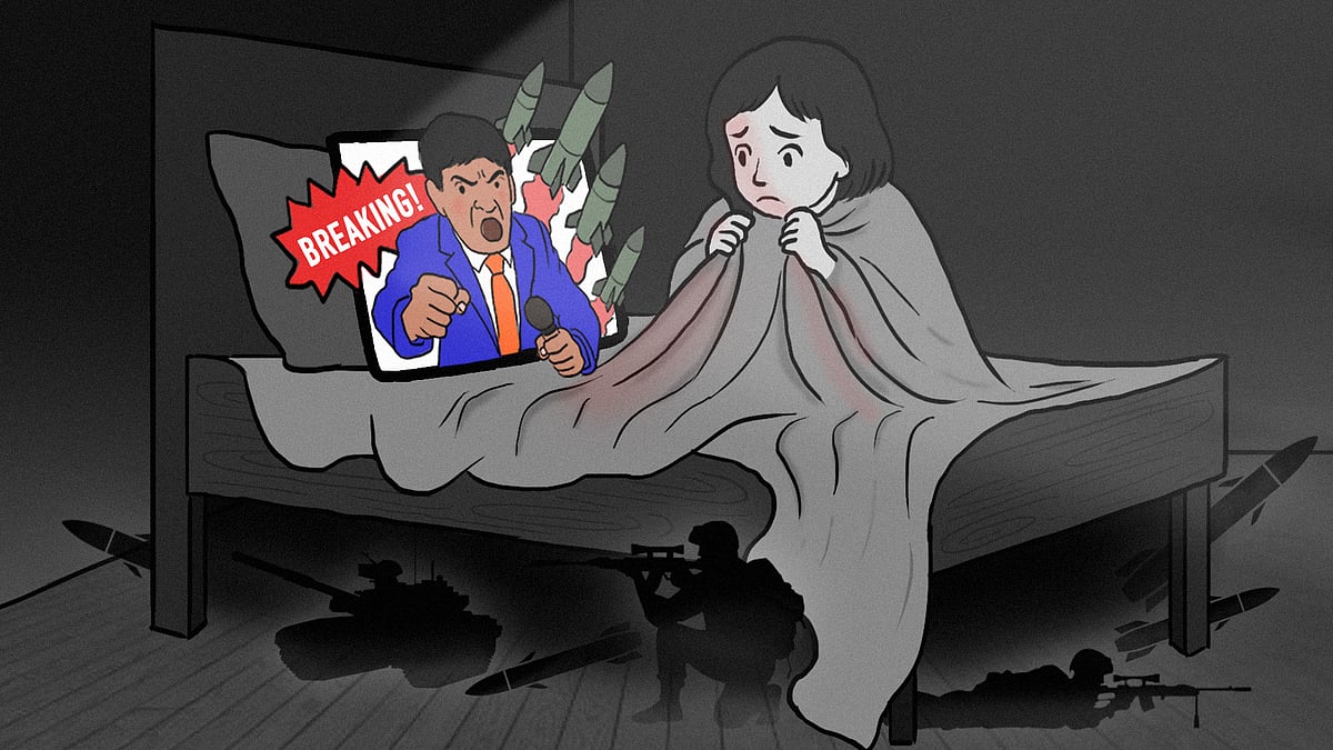 A teen huddled in bed, blanket to their chin, with a tablet showing an anchor with missiles behind him.