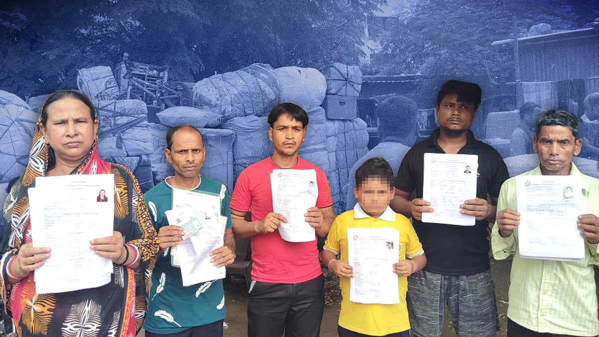 गुरुग्राम में बंगाली प्रवासी अपने आधिकारिक दस्तावेज़ों के साथ.