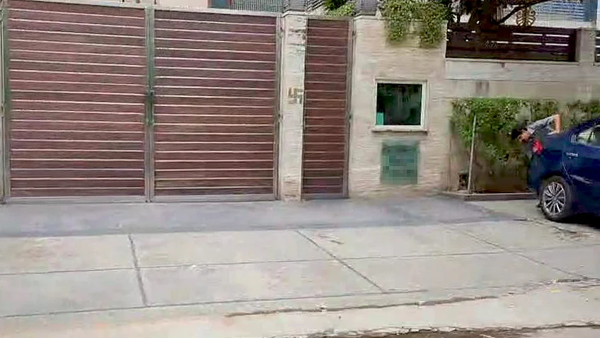 A footpath encroached by a driveway
