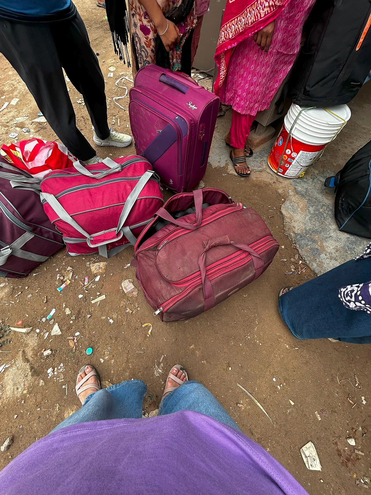 A family with their packed luggage.