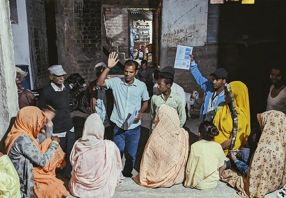 HOWL members conducting a discussion with members of the Parvatpura  Panchayat Development Committee.