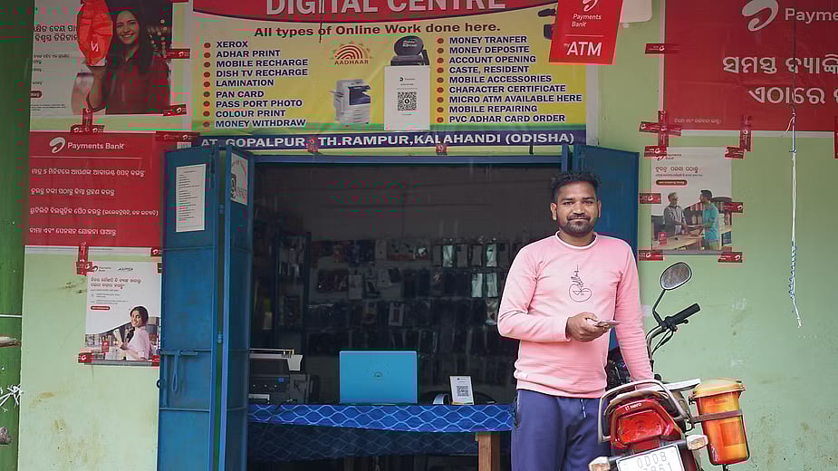 Rajan Naik runs a digital centre where locals can withdraw money with ease, as well as perform other essential services.