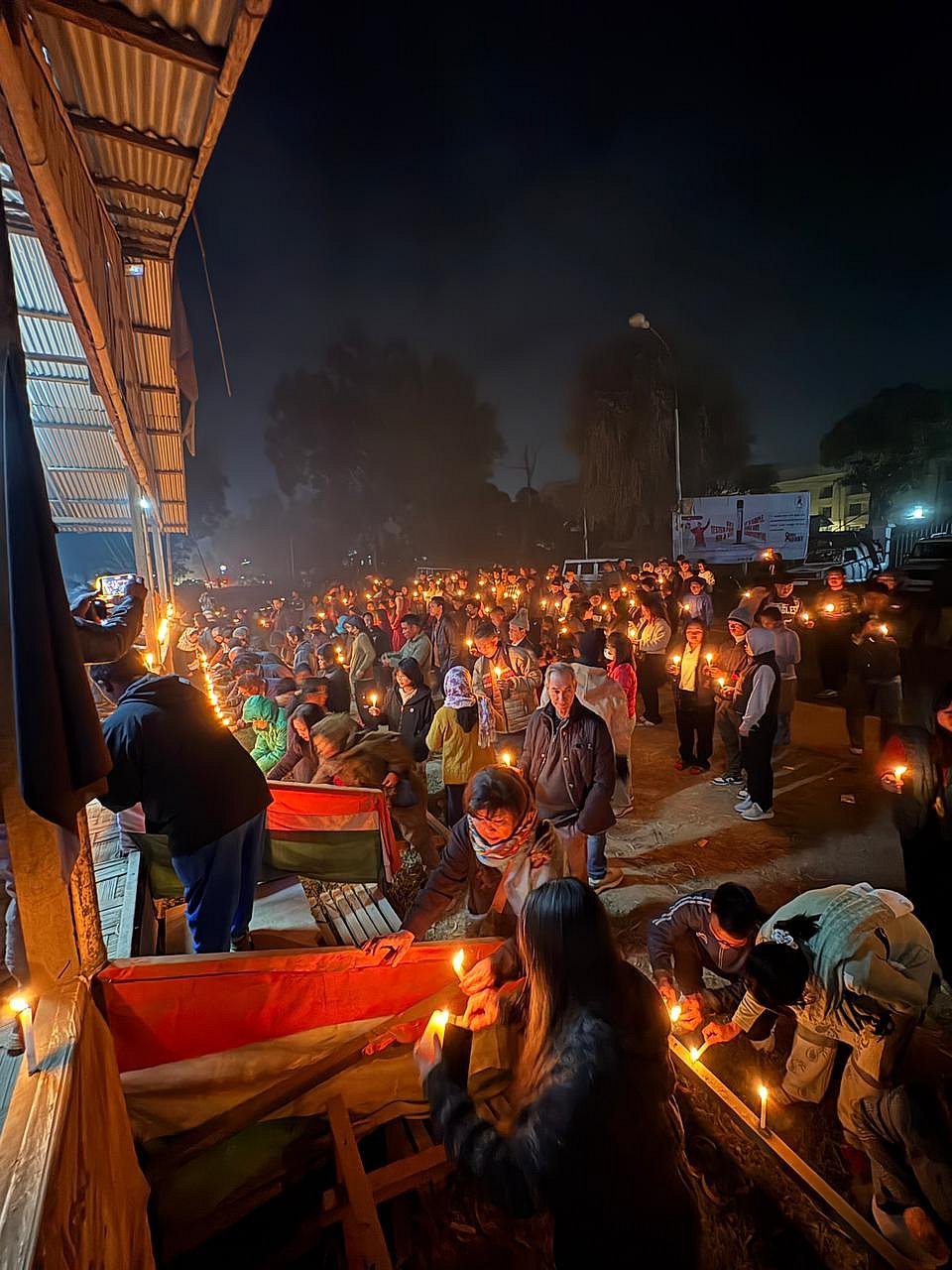 The candlelight vigil held in remembrance of the victim.