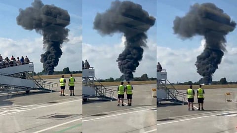 തകർന്ന വിമാനത്തിൽ നിന്നും പുക ഉയരുന്നതിൻ്റെ ദൃശ്യങ്ങൾ