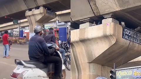 പില്ലറിന് മുകളിൽ യുവാവ് കിടന്നുറങ്ങുന്നതിൻ്റെ ദൃശ്യങ്ങൾ