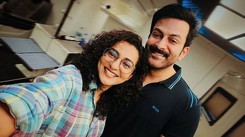 പാർവതി തിരുവോത്തും പൃഥ്വിരാജും