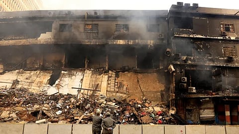 Death toll in Karachi mall fire rises to at least 14 in Pakistan