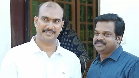 കുമ്മണ്ണൂർ സാദിഖ് കെ.യു ജനീഷ് കുമാറിനൊപ്പം