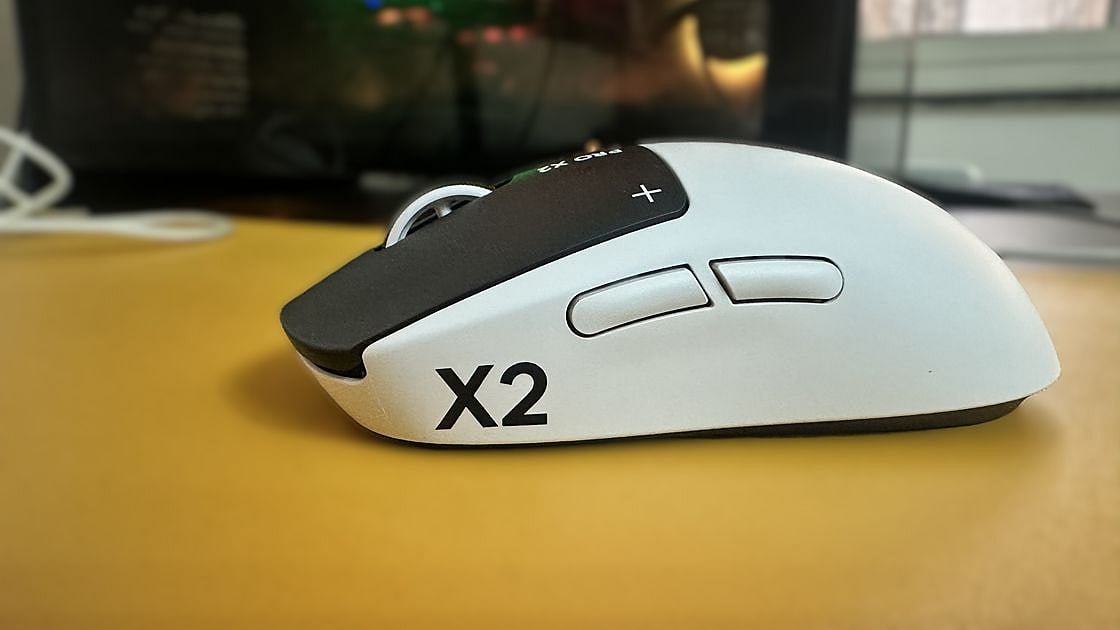 Right side of Logitech G Pro X2 Superlight gaming mouse showing X2 branding and two side buttons