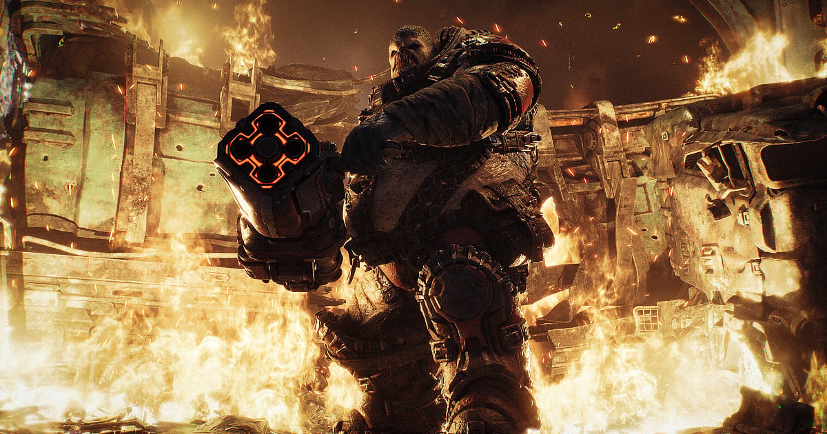 Armored COG soldier wielding a glowing weapon amid flames and ruins in Gears of War: E-Day.