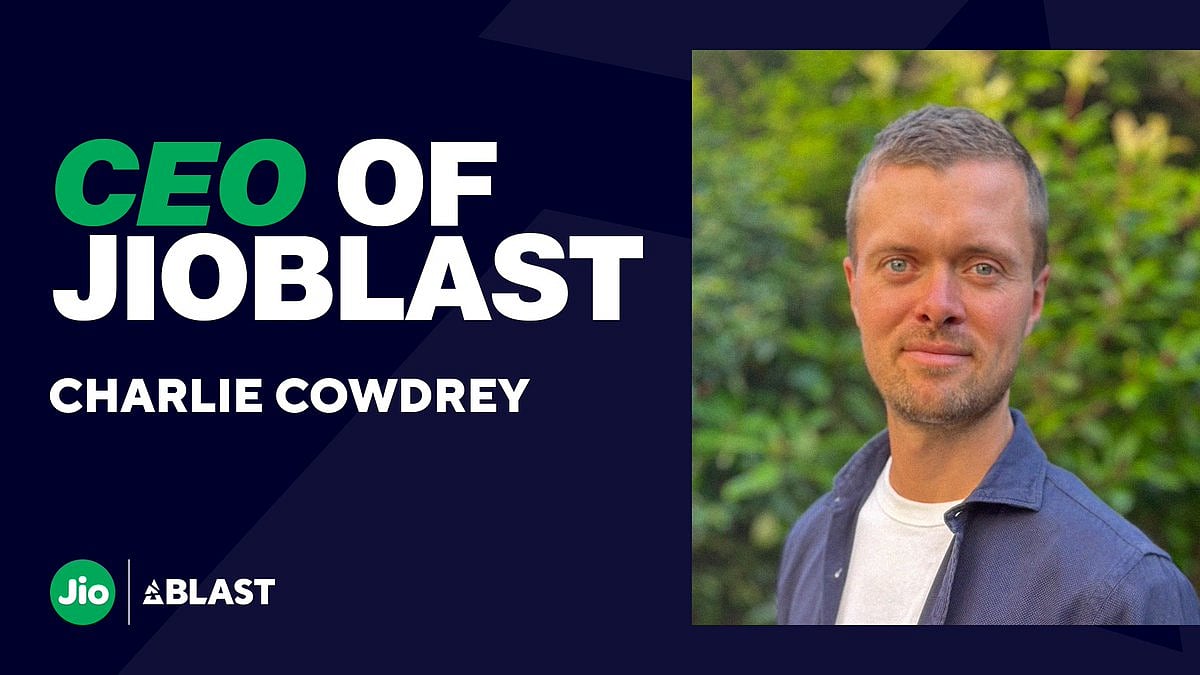 Charlie Cowdrey, CEO of JioBLAST, head and shoulders against green foliage, beside Jio and BLAST logos