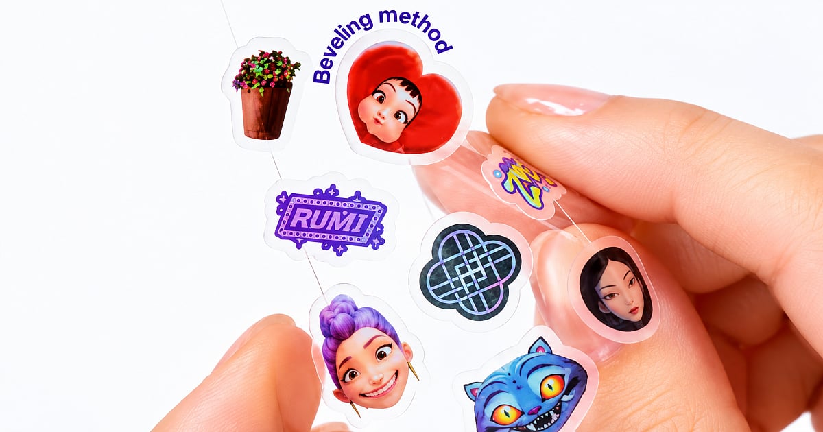 Anua x KPop Demon Hunters spot patch sheet held between fingers, featuring character-inspired designs including Rumi, a purple-haired character, a blue cat, and colorful symbols.