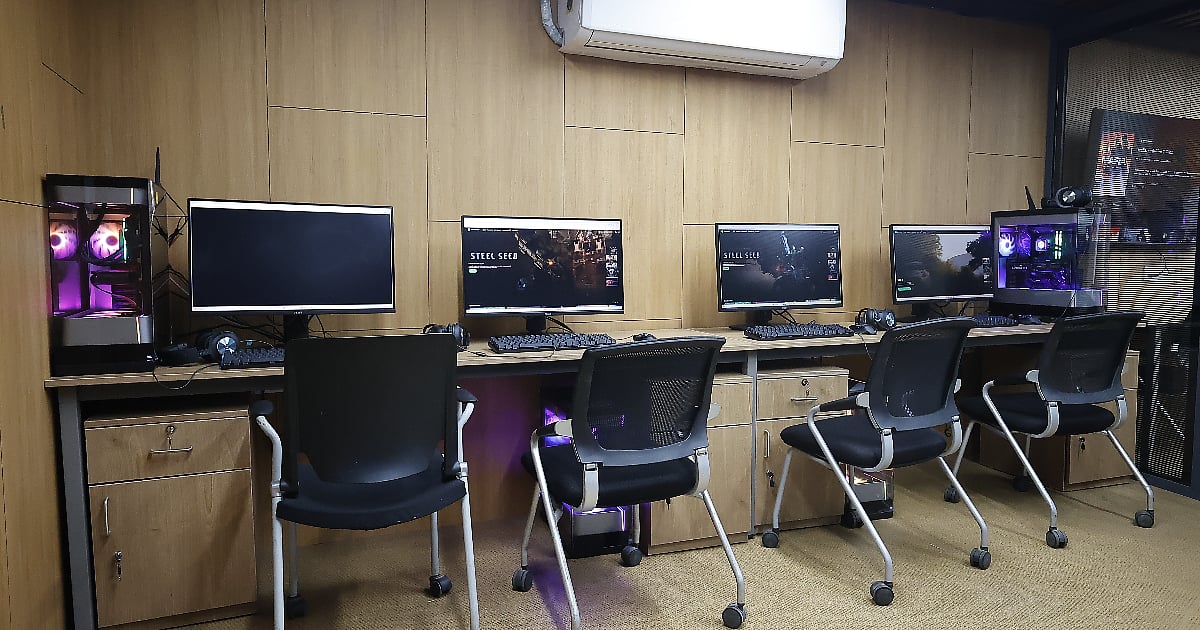 CyberPowerPC gaming PCs and workstations set up in a computer lab at Karnavati University.