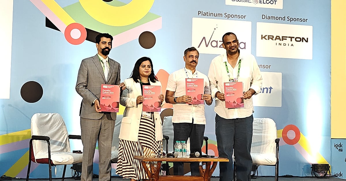 GDAI representatives pose on stage holding copies of the GameDev Outlook 2026 report during its launch at IGDC 2026.