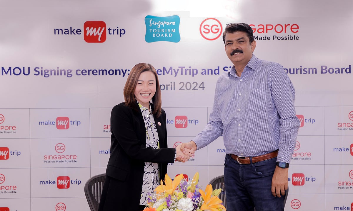 Melissa Ow, Singapore Tourism Board’s chief executive with Rajesh Magow, co-founder and Group CEO of MakeMyTrip