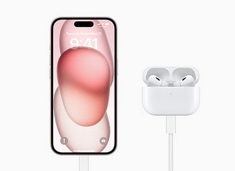 The AirPods (2nd generation) and iPhone 15.