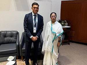 Sajjan Jindal_@#X : JSW Group chairman Sajjan Jindal with West Bengal Chief Minister Mamta Banerjee