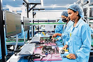 Women workers at a Zetwerk
Electronics facility