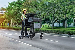An operator with the Bandicoot scavenging robot
