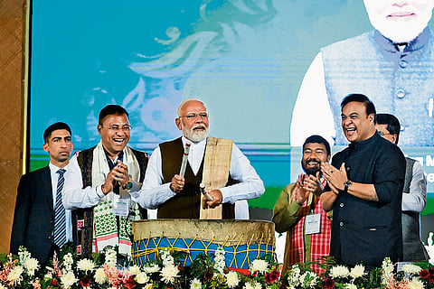 Prime Minister Narendra Modi Beats The Traditional Drum During Jhumoir Binondini