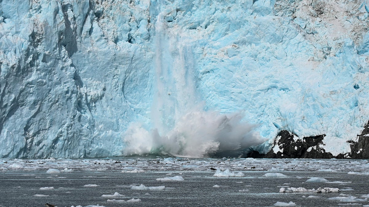 Photo by Yuanpang  Wa : Massive ice chunks break off from Argentina’s Perito Moreno glacier, highlighting recent changes in the glacier’s stability