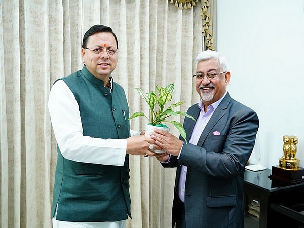 Commerce Secretrary Sunil Barthwal with CM Pushkar Dhami in Dehradun - ANI